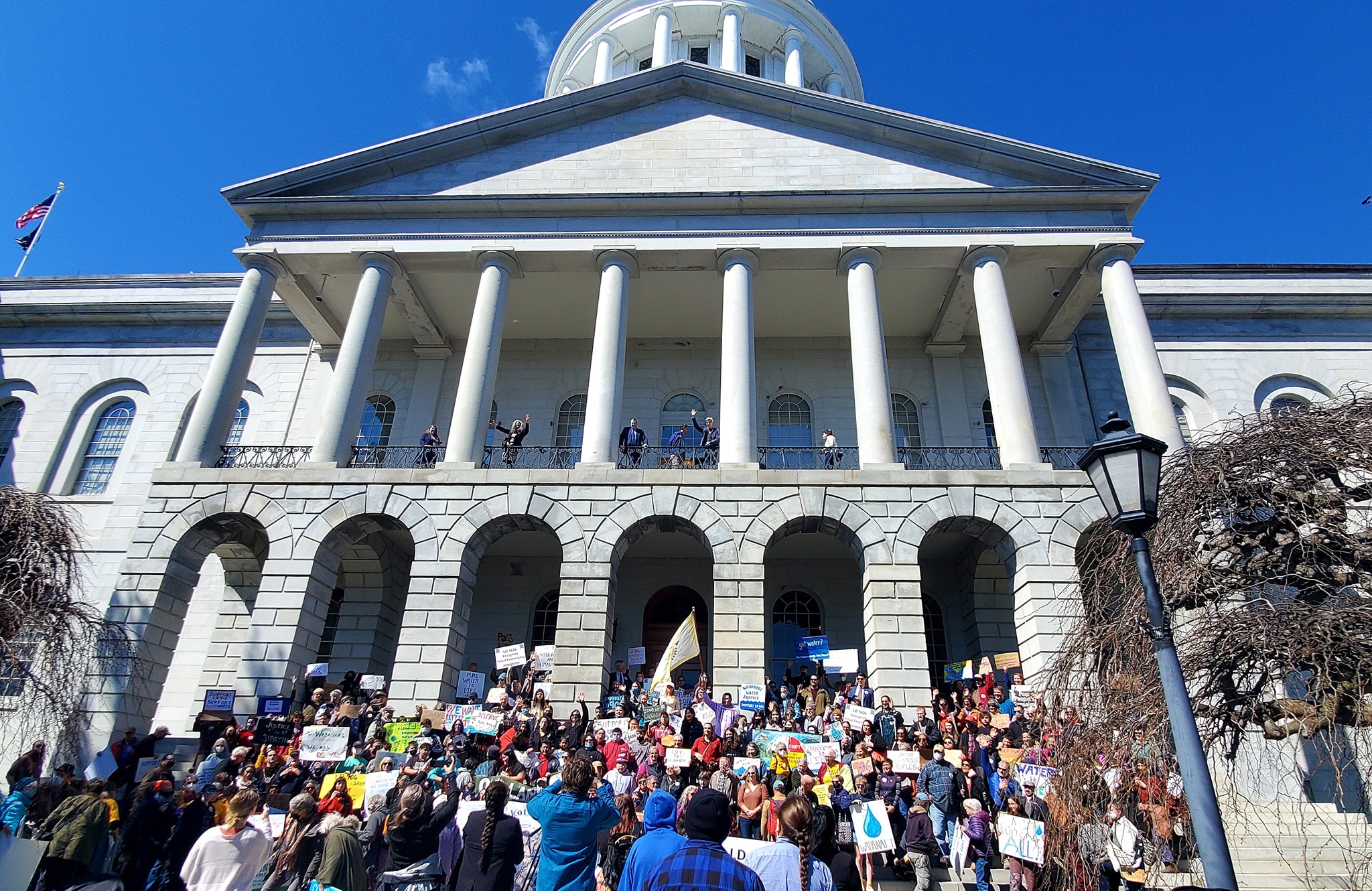 Large crowd protests outside Maine State House