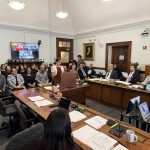 Legislative committee room with people waiting to testify in support of a bill