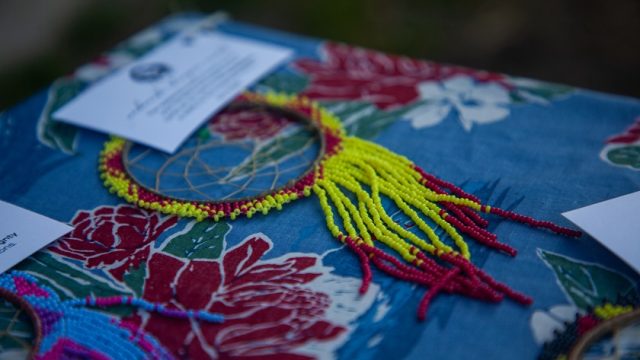 Wabanaki Champion award recipients each received an intricately designed dreamcatcher created by Martha Newell Bassett, a Penobscot and Passamaquoddy artist. dreamcatcher made of yellow and red beads